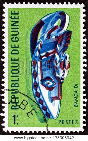 GUINEA - CIRCA 1967: a stamp printed in Guinea shows Small Banda Mask Kanfarade Boke Region circa 1967