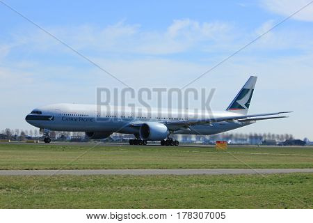 Amsterdam the Netherlands - March 25th 2017: B-KQY Cathay Pacific Boeing 777-300 takeoff from Polderbaan runway.