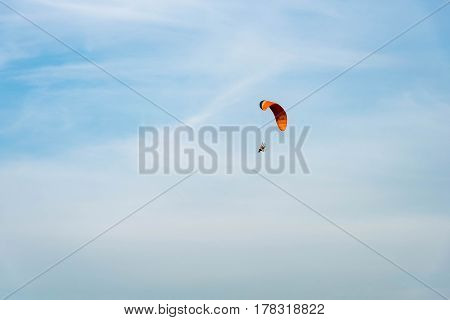 Man Ride Paramotor Flying In The Sky
