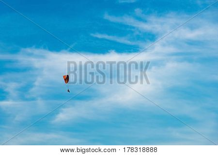 Man Ride Paramotor Flying In The Sky