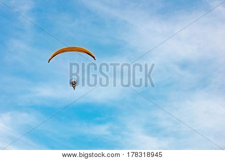 Man Ride Paramotor Flying In The Sky