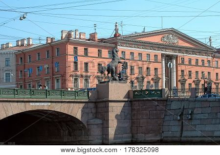 Saint-Petersburg, Russia - May 13, 2006: The Anichkov Bridge with The Horse Tamers by Peter Klodt across The Fontanka River near Nevsky Avenue