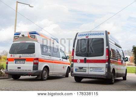 PEINE / GERMANY - MARCH 20 2017: two german ambulance vehicles stands on hospital at peine / germany