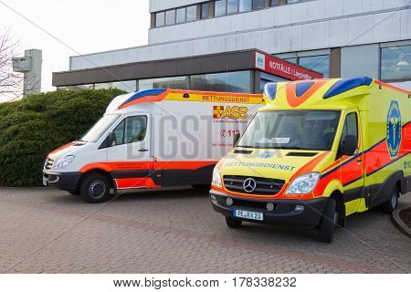 PEINE / GERMANY - MARCH 20 2017: two german ambulance vehicles stands on hospital at peine / germany