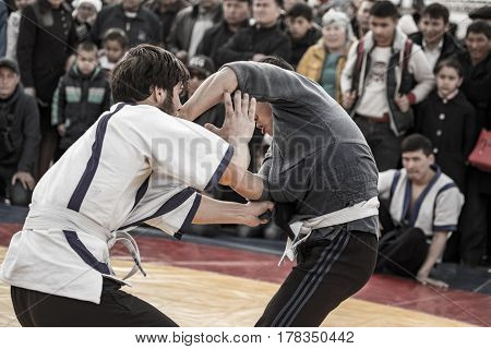 Shymkent, KAZAKHSTAN - 22 March 2017: Celebration of the Kazakh holiday NARIYZ. Competition wrestlers .