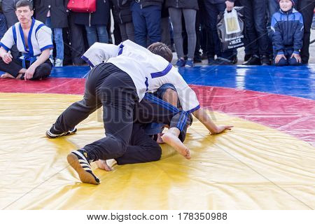 Shymkent, KAZAKHSTAN - 22 March 2017: Celebration of the Kazakh holiday NARIYZ. Competition wrestlers .