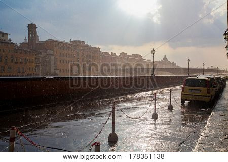 Florence City In Italy In The Rain. Beautiful Sky And Sun