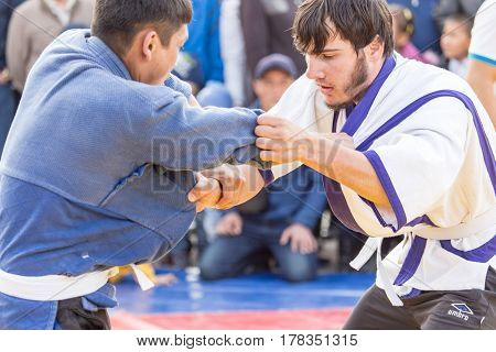 Shymkent, KAZAKHSTAN - 22 March 2017: Celebration of the Kazakh holiday NARIYZ. Competition wrestlers .