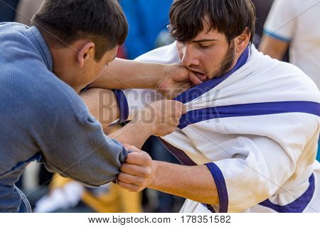 Shymkent, KAZAKHSTAN - 22 March 2017: Celebration of the Kazakh holiday NARIYZ. Competition wrestlers .