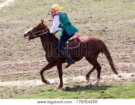 Shymkent, KAZAKHSTAN - 22 March 2017: Celebration of the Kazakh holiday NARIYZ. Competitions on horses .