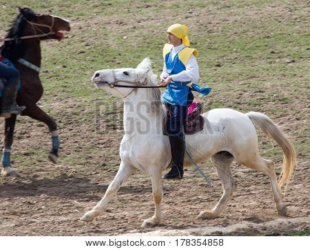 Shymkent, KAZAKHSTAN - 22 March 2017: Celebration of the Kazakh holiday NARIYZ. Competitions on horses .