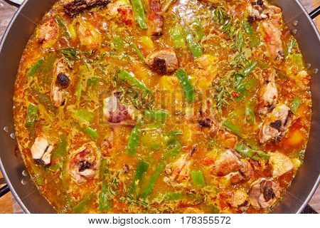 Paella from Spain recipe process boiling broth step by step