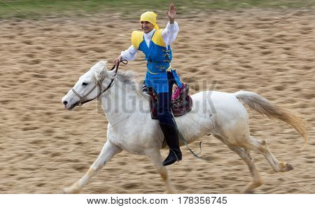 Shymkent, KAZAKHSTAN - 22 March 2017: Celebration of the Kazakh holiday NARIYZ. Competitions on horses .