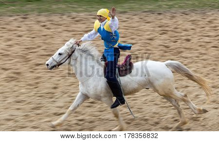 Shymkent, KAZAKHSTAN - 22 March 2017: Celebration of the Kazakh holiday NARIYZ. Competitions on horses .