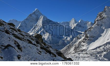 Morning in the Mount Everest National Park. Mount Ama Dablam after new snowfall.