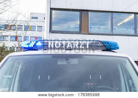 german emergency doctor ( notarzt ) car stands on a hospital