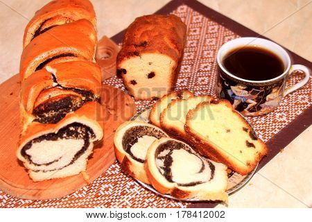 Bakery products. Very fresh buns with poppy seeds and muffins with raisins. Great fun to eat this snack and drink coffee or tea.