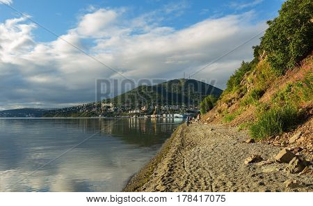 City beach on Ozernovskaya spit, the shore of Avacha Bay in Petropavlovsk-Kamchatsky.