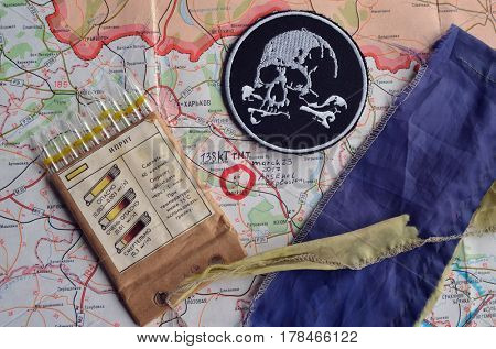 Chevron of Ukraine army.Back-Map of Ukraine  with location of Balakleya .Place of arsenal explosion at 23 march. 138 kT. of TNT power.March 23 ,2017 in Kiev, Ukraine