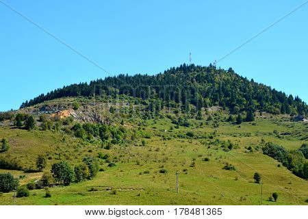 Landscape in Apuseni Mountains. The Apuseni Mountains is a mountain range in Transylvania, Romania, which belongs to the Western Romanian Carpathians, also called Occidentali in Romanian. The Apuseni Mountains have about 400 caves