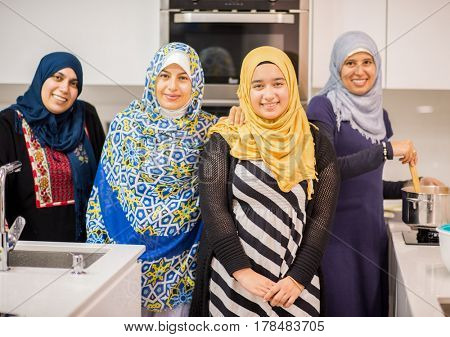 Arabian girls and women in kitchen