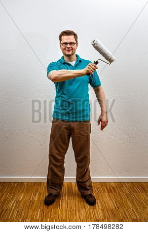 Man Paints On Imaginary Concept Wall, Vertical Format