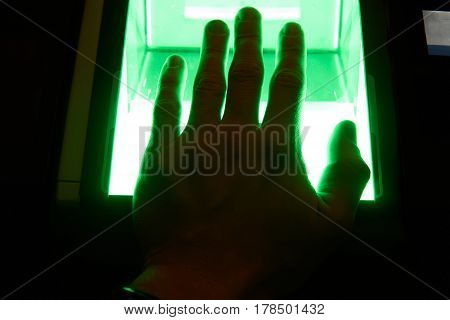 green cybersecurity digital fingerprint scanning on a green screen
