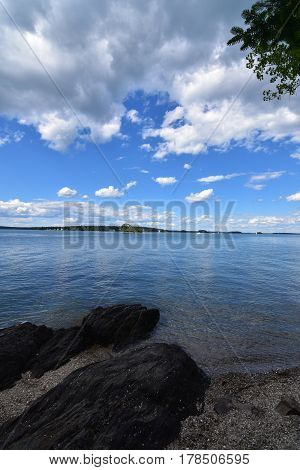 Beautiful scenic view from a rocky beach in Casco Bay in Maine.