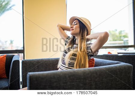 Young Woman Lying On Couch