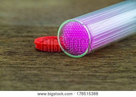 Close up capillary tube Medical equipment on wooden backgroundselective focus.