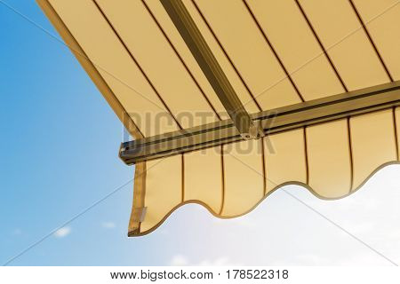 sun protection - awning against blue sky