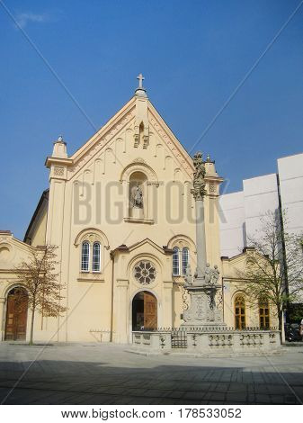 Capuchin Church and Monastery building and square in old town of Bratislava, capital of Slovakia, eastern Europe. Popular city tourist travel landmark, ancient architecture church during early morning day hours.