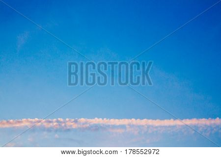 Horizon Line Cloud on Clear Blue Sky