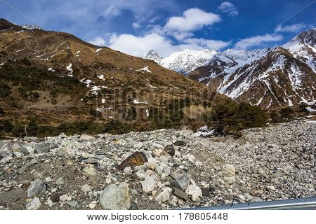 Descended a mudflow from stones in the mountain gorge, the North Caucasus, a mountain landscape