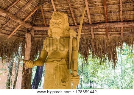 Stone statue of famous chief of Vedda tribe in Sri Lanka