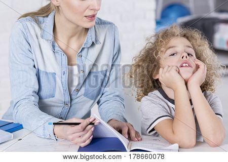 Boy Unwilling To Do Homework
