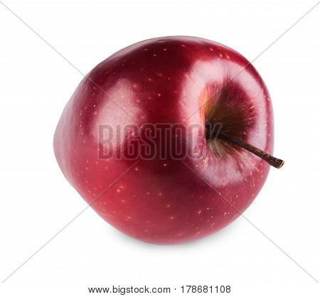 One purplish glossy red apple isolated on white background. Closeup image of sweet fruit, healthy natural organic food