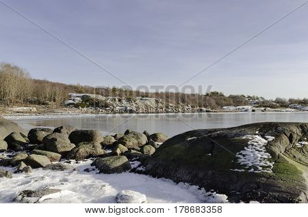the sun is shining on the rock a winterday on swedish west-coast