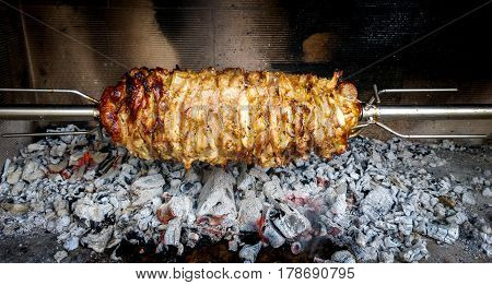 Making Home Made Cag Kebab Gyros With Fire And Charcoal.