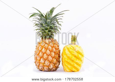 peeled  pineapple and ripe pineapple  on white background healthy pineapple fruit food isolated