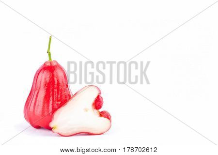 half  rose apple and   water apples   ( chomphu ) on white background healthy rose apple fruit food isolated