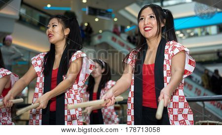 Moscow, Russia - March 25, 2017: Group Of Japanese Taiko Drummers Girls Perform In Kaleidoscope Shop