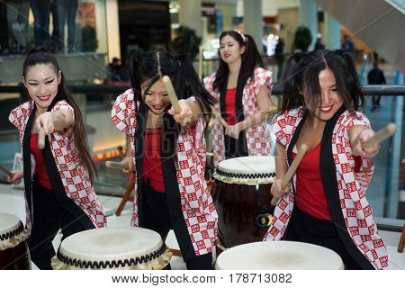 Moscow, Russia - March 25, 2017: Group Of Japanese Taiko Drummers Girls Perform In Kaleidoscope Shop