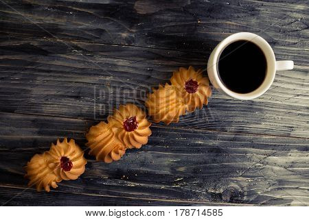 Cookies kurabe on a wooden table in a rustic style.