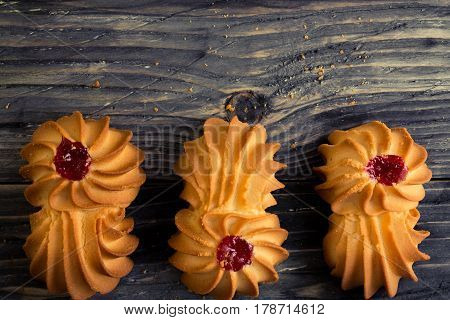 Cookies kurabe on a wooden table in a rustic style.