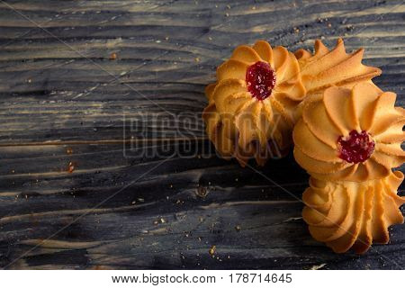 Cookies kurabe on a wooden table in a rustic style.