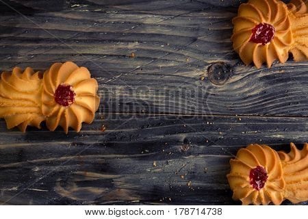 Cookies kurabe on a wooden table in a rustic style.
