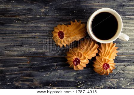 Cookies kurabe on a wooden table in a rustic style.