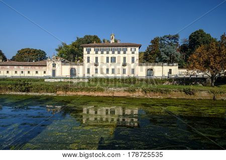 Cassinetta di Lugagnano (Milan Lombardy Italy): facade of the historic Villa Visconti Maineri along the canal known as Naviglio Grande of Turbigo