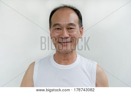 portrait of old man asia wear white shirt on white background